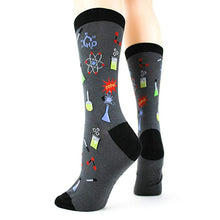 Load image into Gallery viewer, a pair of women&#39;s chemistry novelty socks on feet

