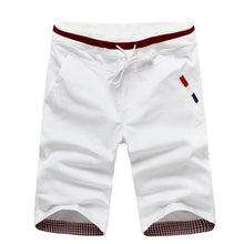 Load image into Gallery viewer, Front view of white shorts
