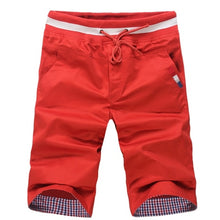 Load image into Gallery viewer, Front view of orange shorts
