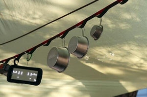 photo of sever stainless bowls in various sizes hanging from zipline